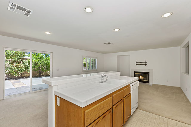 Kitchen Island / Family Room with Fireplace - Gallery Preview